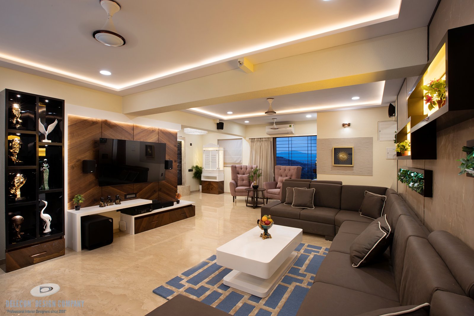 Living room sofa layout with marble and Corian highlights