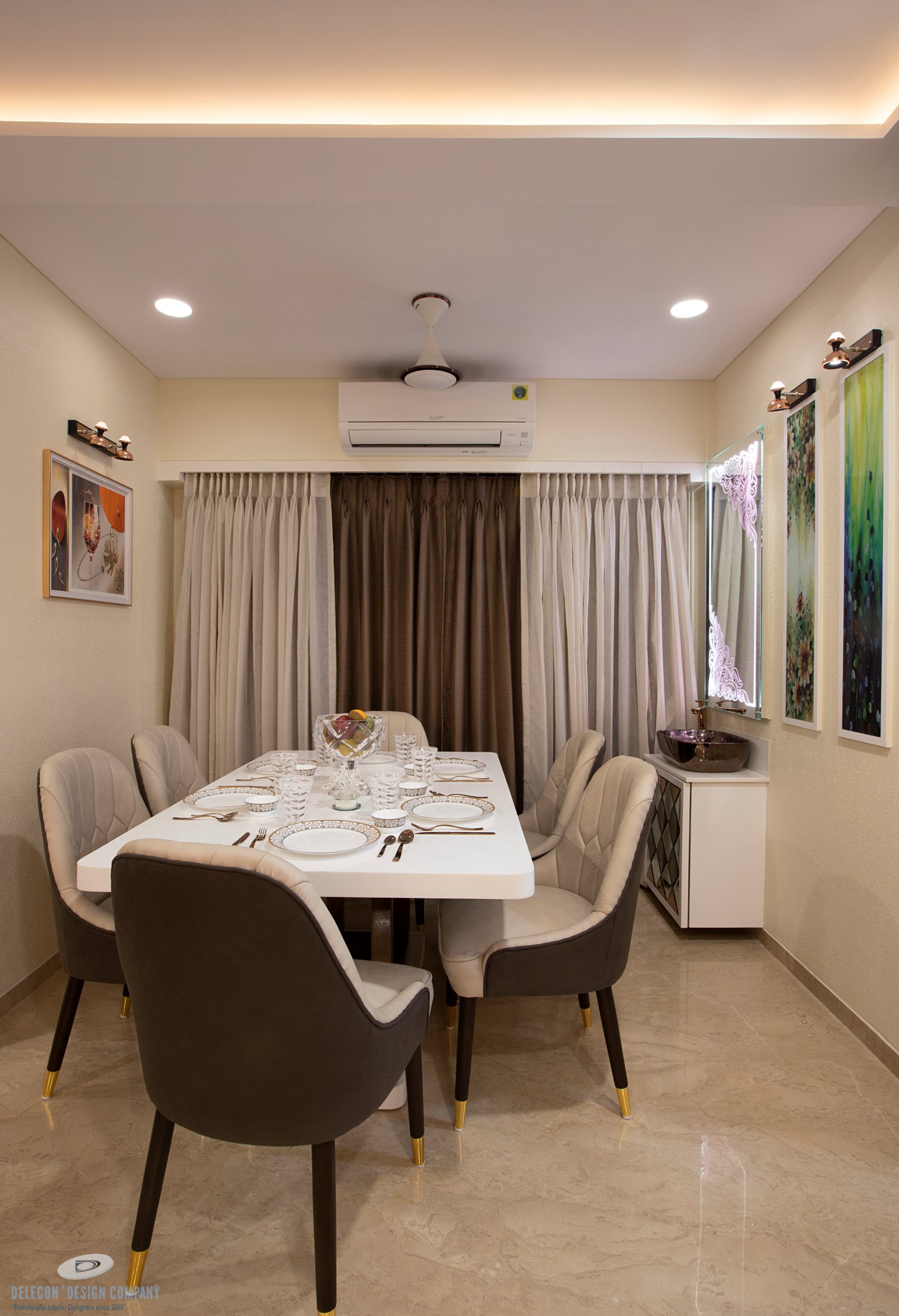 Dining space design with marble and veneer in Navi Mumbai