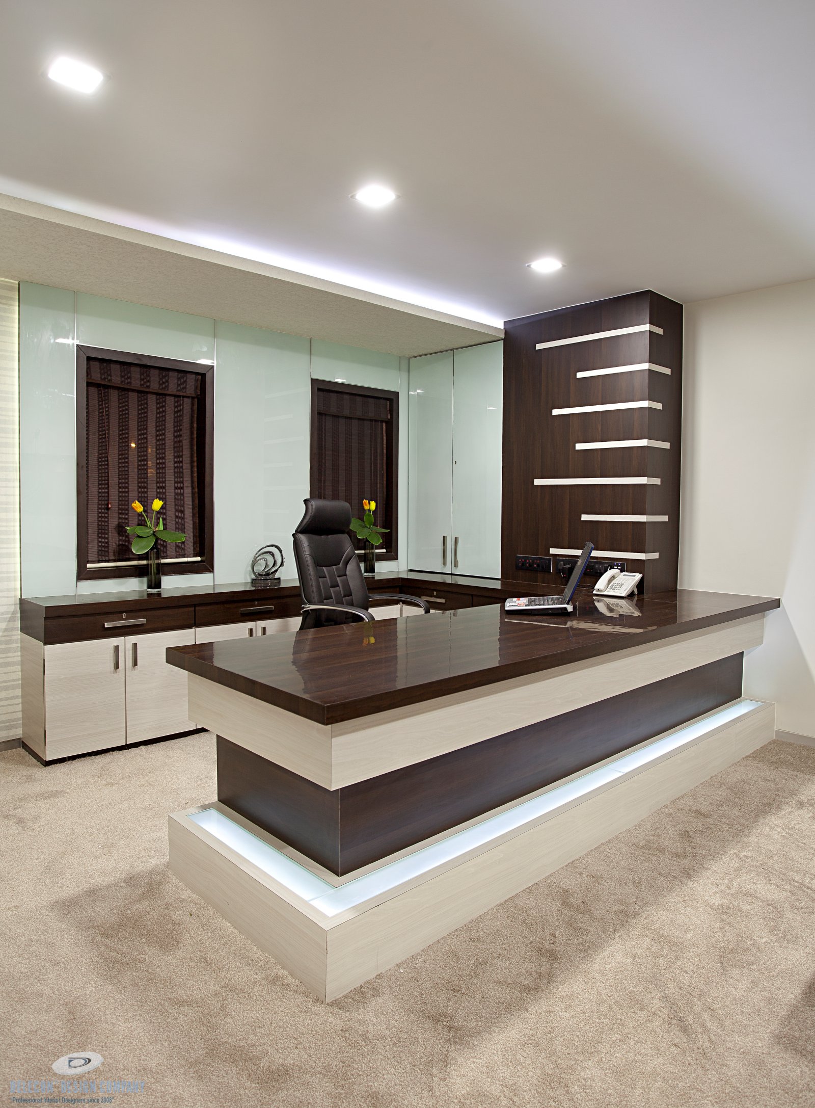 Director cabin seating and work desk at Shelton Group