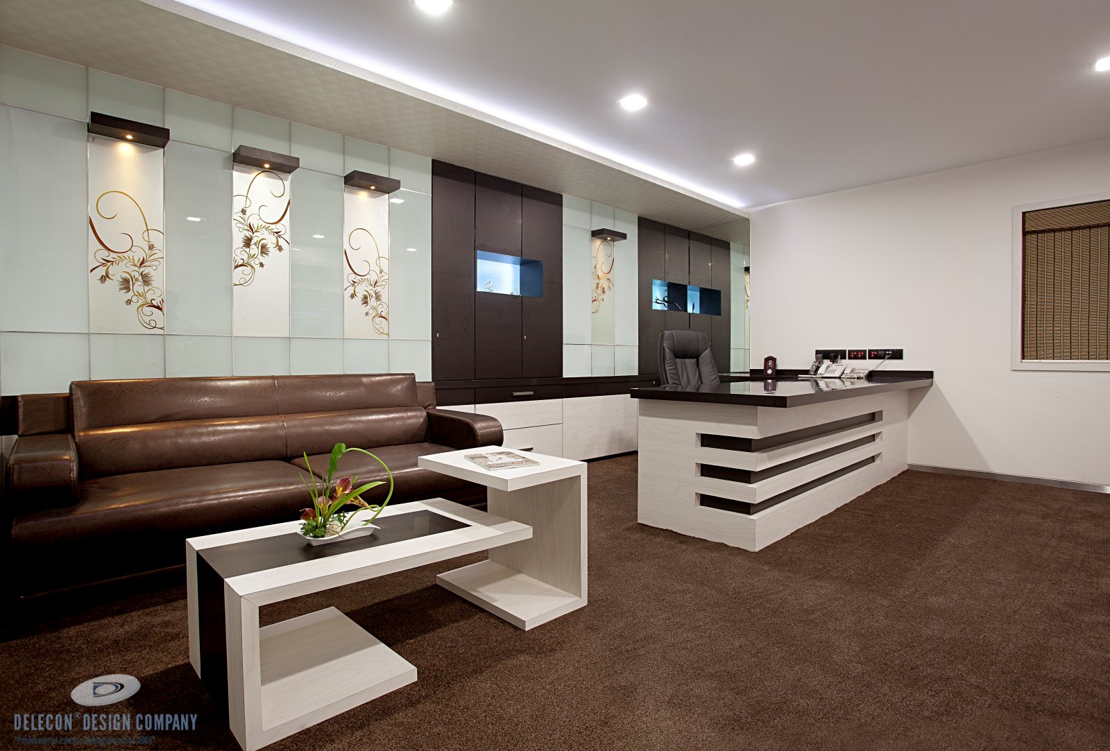 Director cabin interior with glass partition at Shelton Group