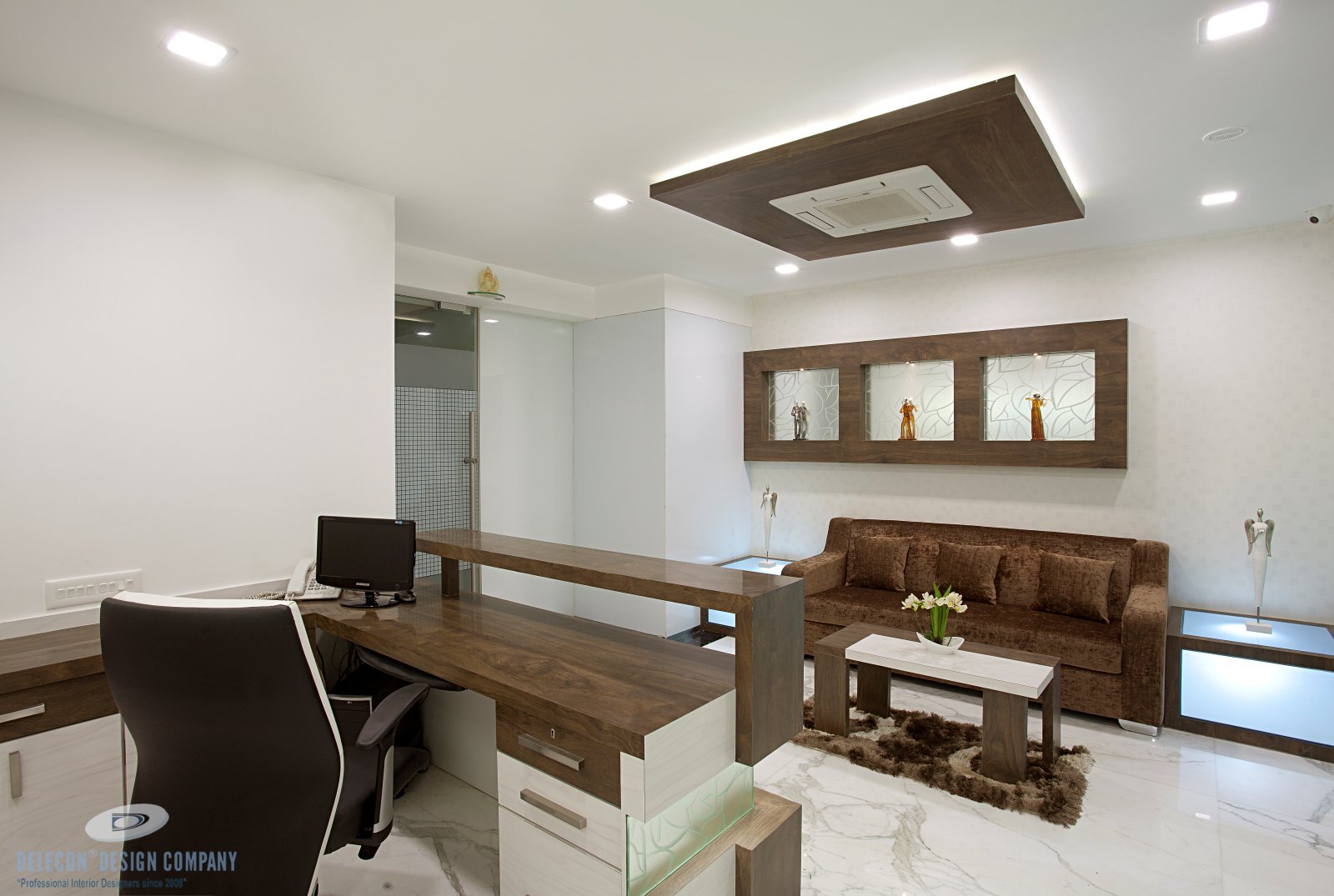 Waiting lounge seating and wall detail at Shelton Group office